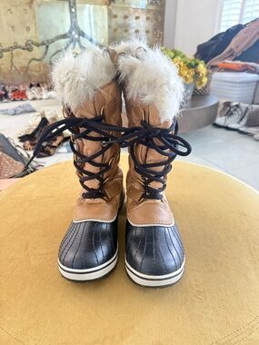 Sorel Two-Tone Faux Fur Lace-Up Winter Boots - Black and Tan